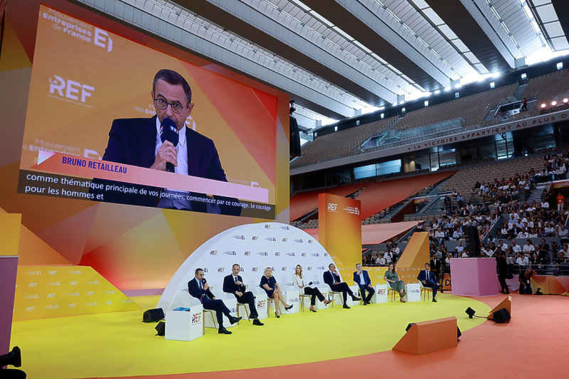 Le Pen seeks to woo top French  business leaders at first debate